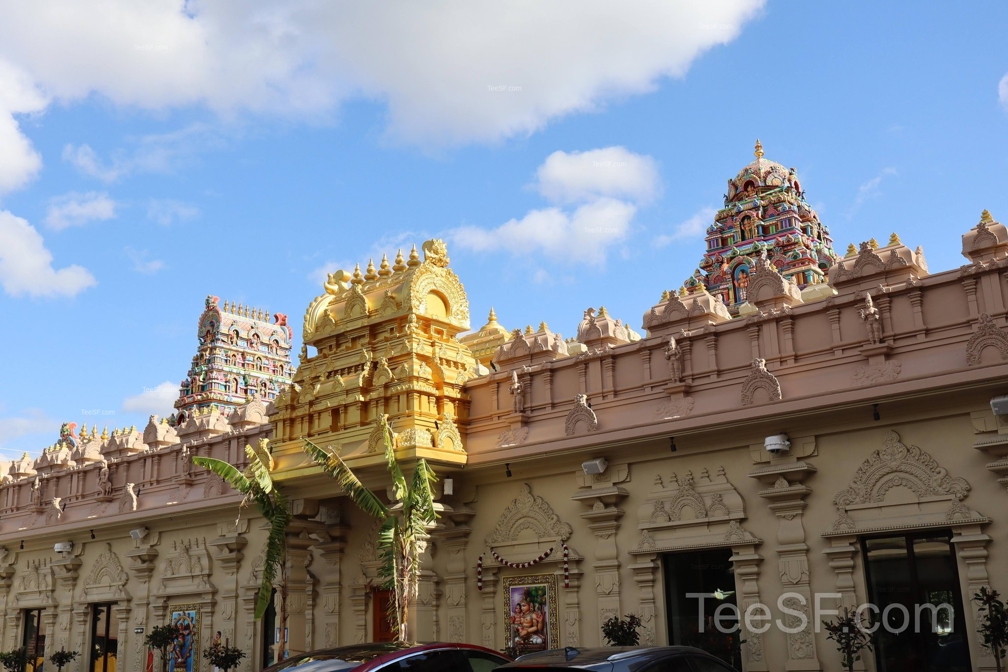 A sunlit exterior view of Shiva Murugan Temple in Concord.